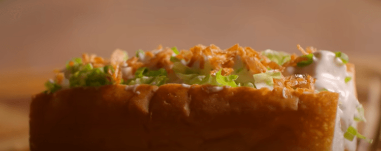 Step 1.2: To assemble the roll, cut open the hot dog bun and apply soft butter