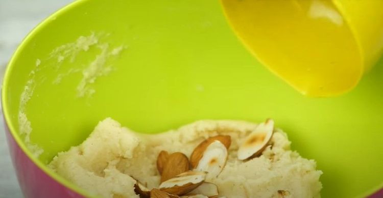 Step 1.1: Add almonds to the dough and mix well