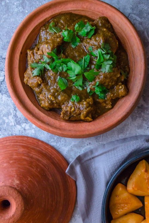 Step 1.1: Pour the stock into the casserole and place the coriander bouquet on top of the meat