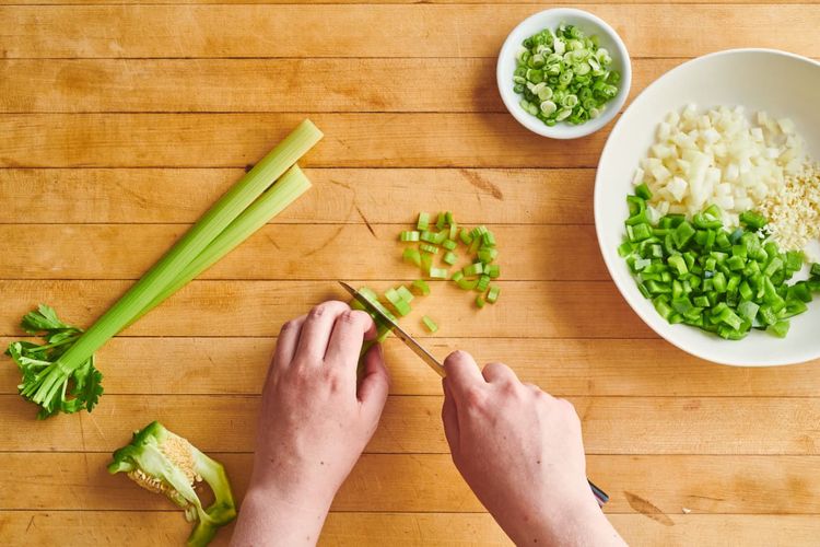 Step 2.1: Dice the yellow onion, celery, and green bell pepper; mince the garlic cloves