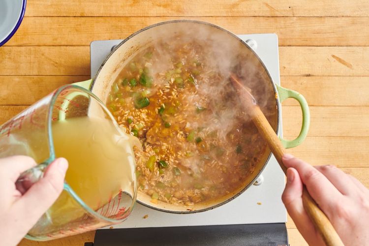 Step 8.1: Pour in water or chicken broth and bring to a boil