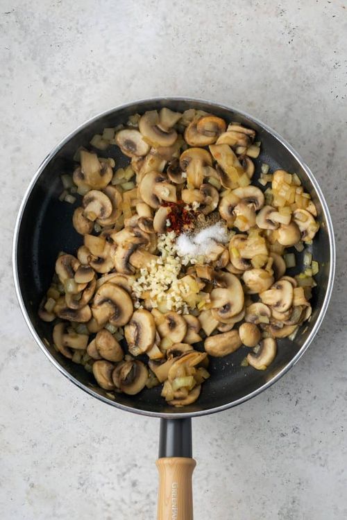 Step 1.1: Add onion and mushrooms and sauté for 5-7 minutes, until tender and the liquid from the mushrooms has been mostly cooked off