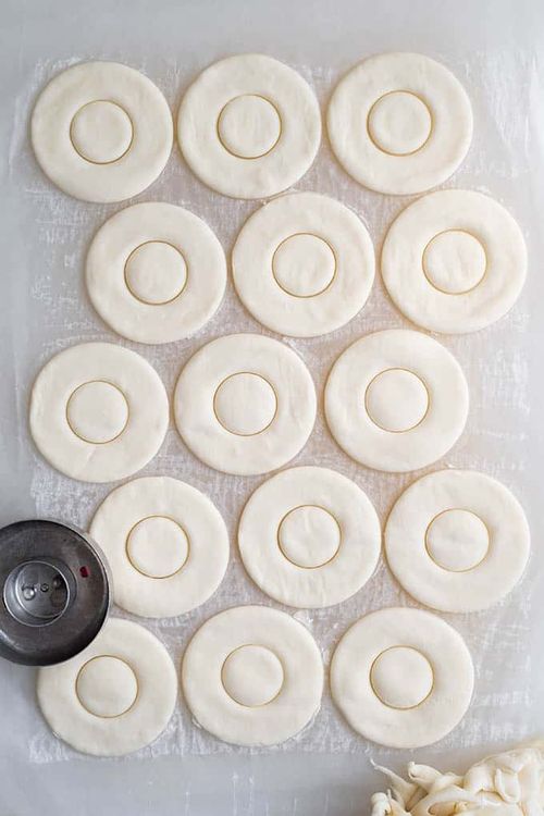 Step 1.1: Using a donut cutter or a large glass and a shot glass, cut the pastry dough into donuts