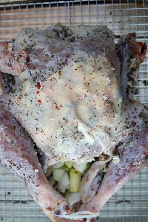 Step 2.1: Place the butter between the skin and breast meat, getting it as far under the turkey skin as possible