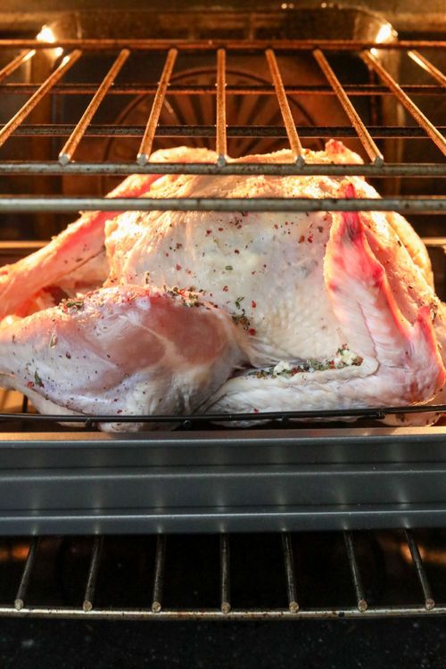 Step 2.1: Remove the cover and pour the apple cider over the turkey, basting every 25-30 minutes