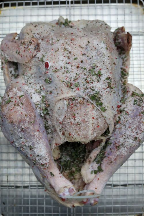 Step 1.1: Separate the skin from the breast and apply the dry brine between the skin and turkey meat, inside the cavity, and then any remainder on the skin