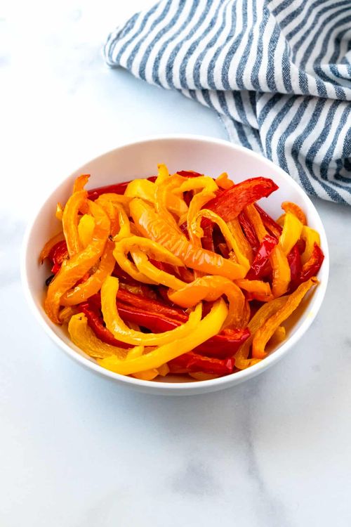 Step 3.2: Stir in the chopped tomatoes and bell pepper