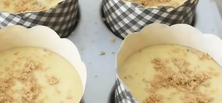 Step 5.1: Pour the mixture into lined baking tins and sprinkle brown sugar on top