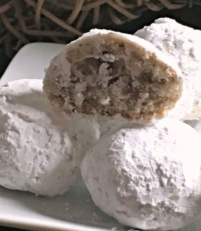 Step 3.1: Once the cookies are completely cool, reroll them in powdered sugar
