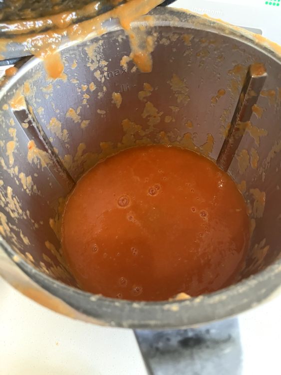 Step 1.4: Once finished roasting, set aside the garlic and peel all the tomatoes, discarding the skins