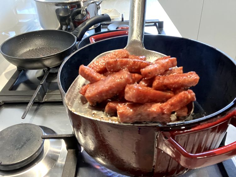Step 2.3: Heat olive oil over medium-high heat in a heavy-based cast iron pot