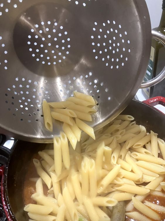 Step 4.3: Add pasta to the sauce along with 1/3 cup of pasta cooking water, Mix through until the sauce is covering the pasta and the meat and mushrooms are nicely incorporated