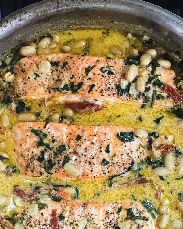 Weeknight Tuscan Salmon with Beans, Spinach, and Sun-Dried Tomato Sauce recipe