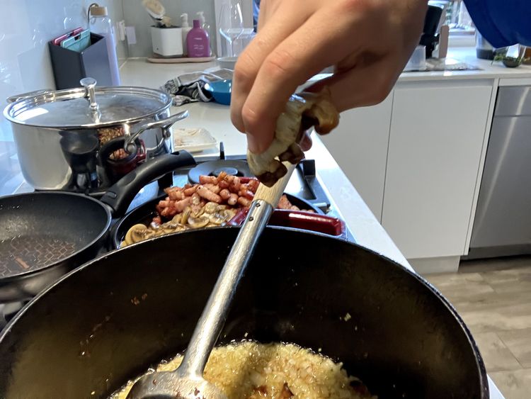 Step 2.3: Let oil cool slightly and then add the shallots, onion, minced garlic, a pinch of salt and squeeze the roasted garlic out of the bulb