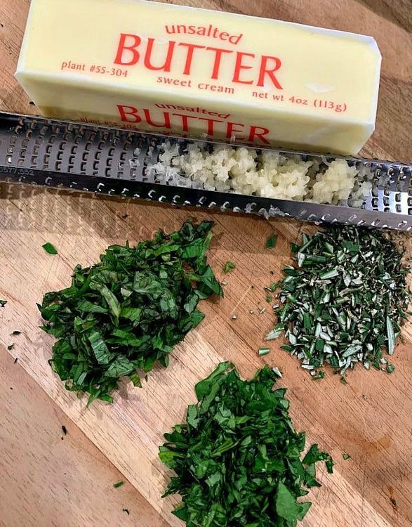 Step 3.1: Stir in half of the parmesan cheese and all of the garlic and herbs into the melted butter