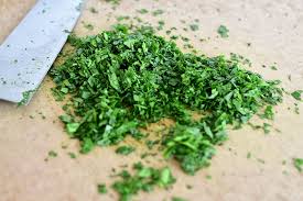 Step 2.1: Gently fold in the chopped parsley and cilantro to the vegetable mixture