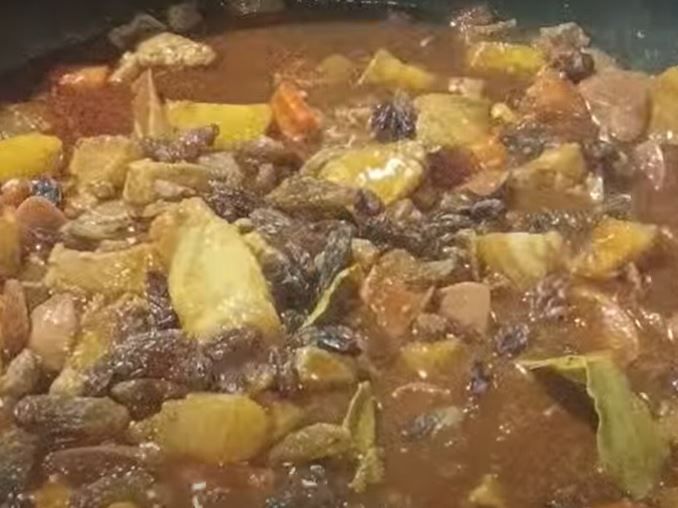 Step 1.3: Once boiling, add the liver spread, laurel leaves, and raisins