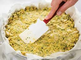 Step 3.2: Spoon the chicken filling into the center of the phyllo layers, spreading it evenly