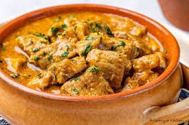 Step 1.2: In a large bowl, combine the lamb or beef with the chopped onion, minced garlic, cumin, coriander, ginger, paprika, saffron (if using), salt, and pepper