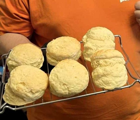 Step 4.1: Let them cool slightly on a wire rack, then serve warm with butter, lemon curd, jam, or cream
