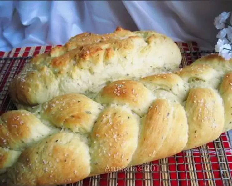 Step 1.1: Cut the dough into quarters, roll each one into a ball and roll out into a rectangle