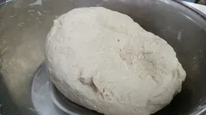 Step 1.1: Turn onto a clean surface and knead for 8–10 minutes until smooth, soft, and stretchy